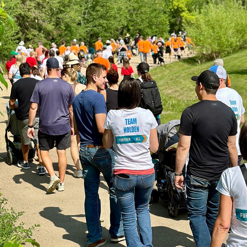A large group of Walkers follow the event path
