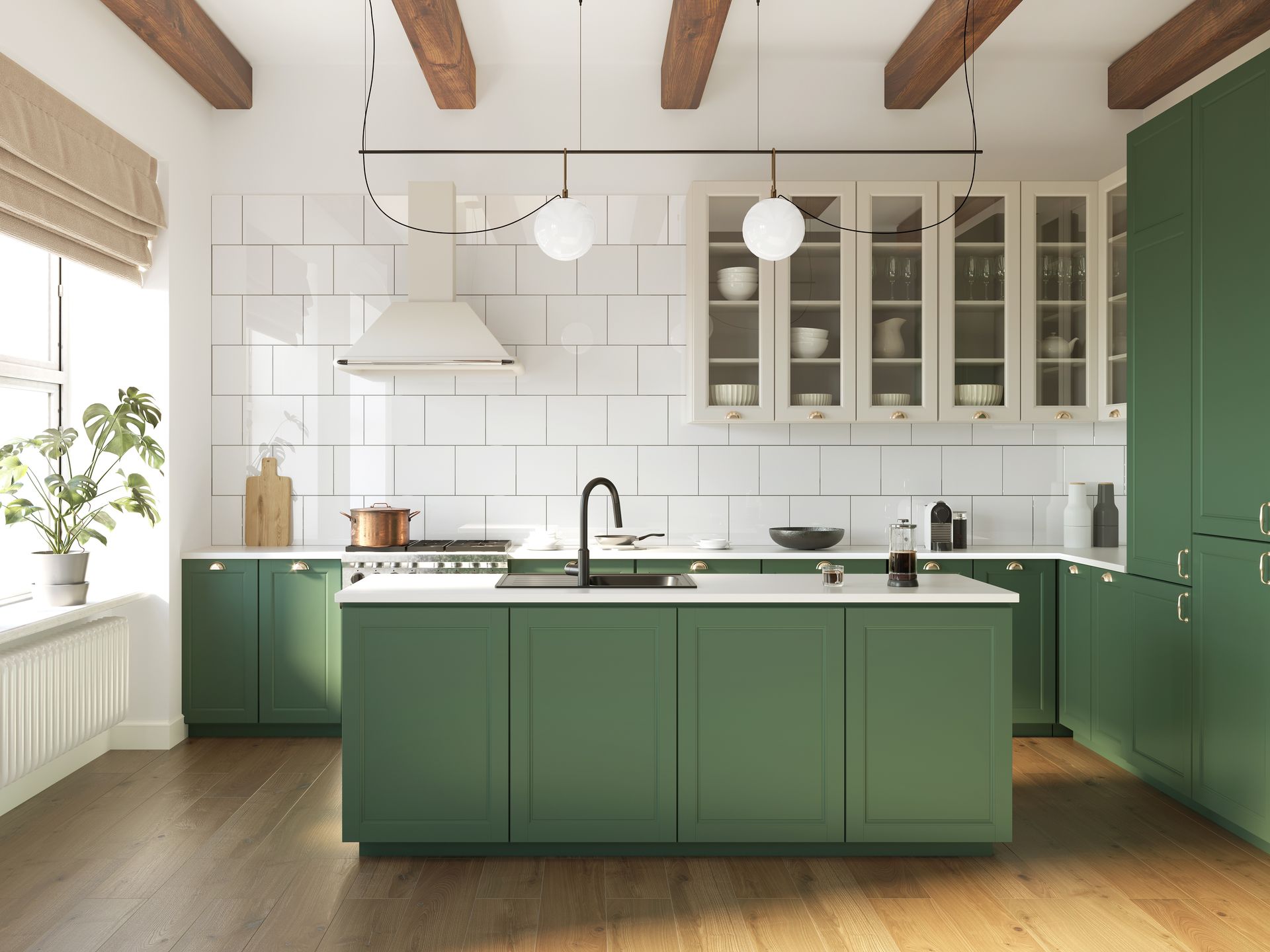 Green kitchen with island, white backsplash, wooden beams, and pendant lights.