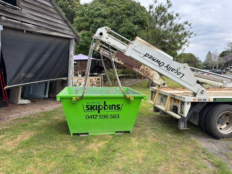 Green Dumpster Sitting On The Ground — Kempsey Skip Bins In South Kempsey, NSW