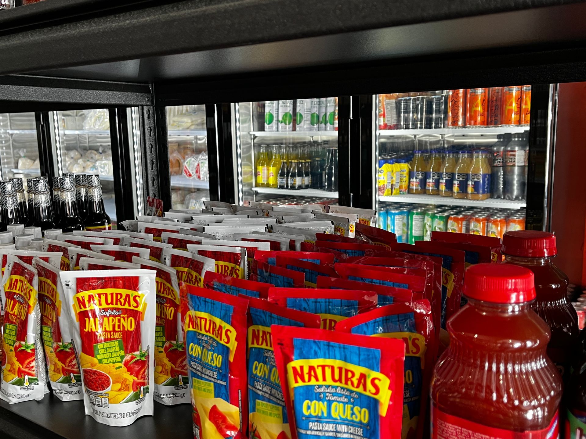 A refrigerator filled with bags of naturas con queso