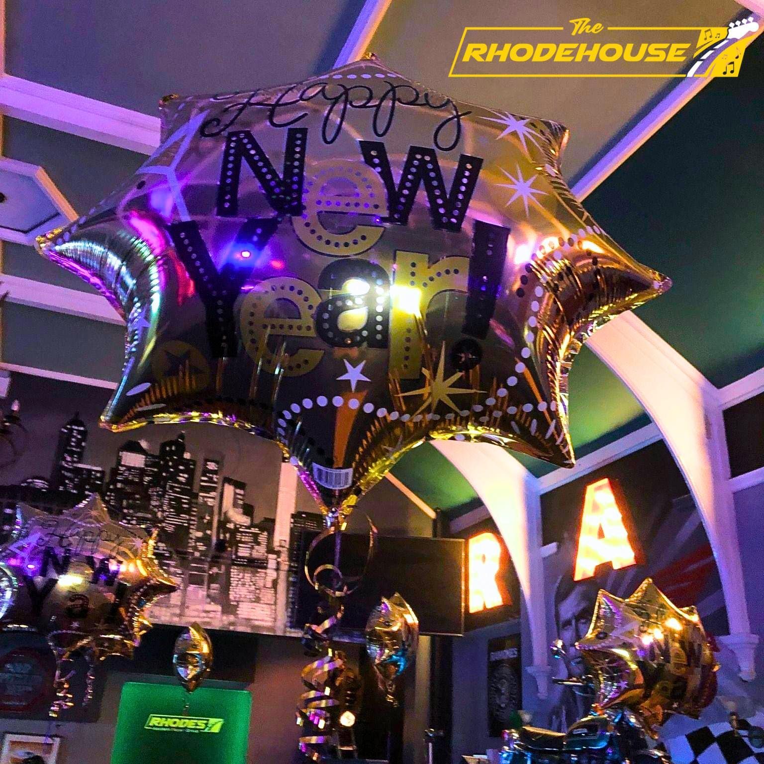 A new year balloon is hanging from the ceiling at the rhodehouse