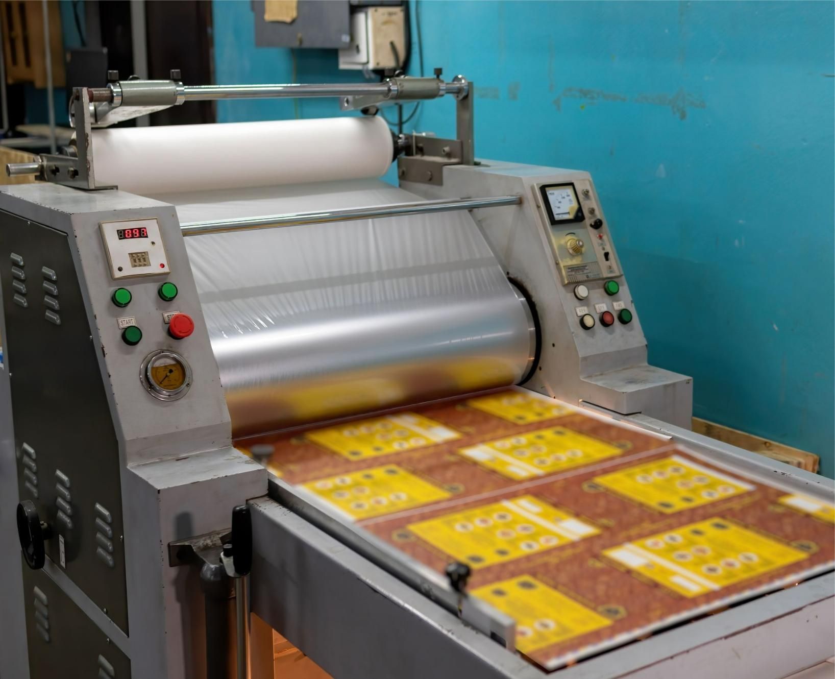 A Machine That Is Making A Lot Of Yellow Cards — Classic Design & Print in Svensson Heights, QLD