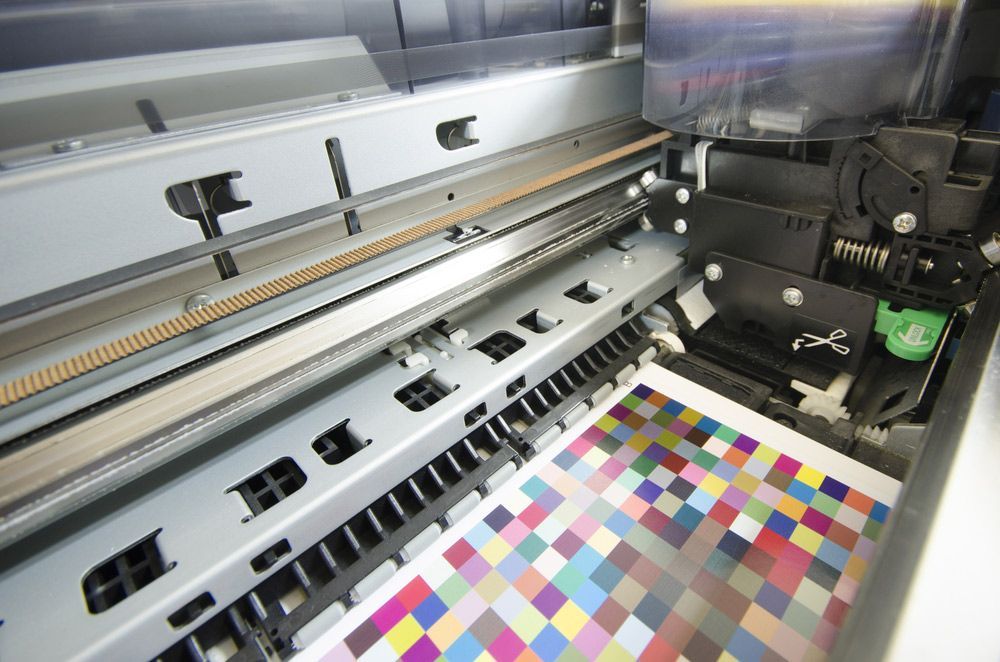 Close Up of an Inkjet Printer Printing a Sheet of Paper — Classic Design & Print in Bundaberg, QLD