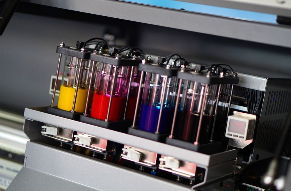 Close Up of a Printer With Colour Bottles of Ink on It — Classic Design & Print in Bundaberg, QLD
