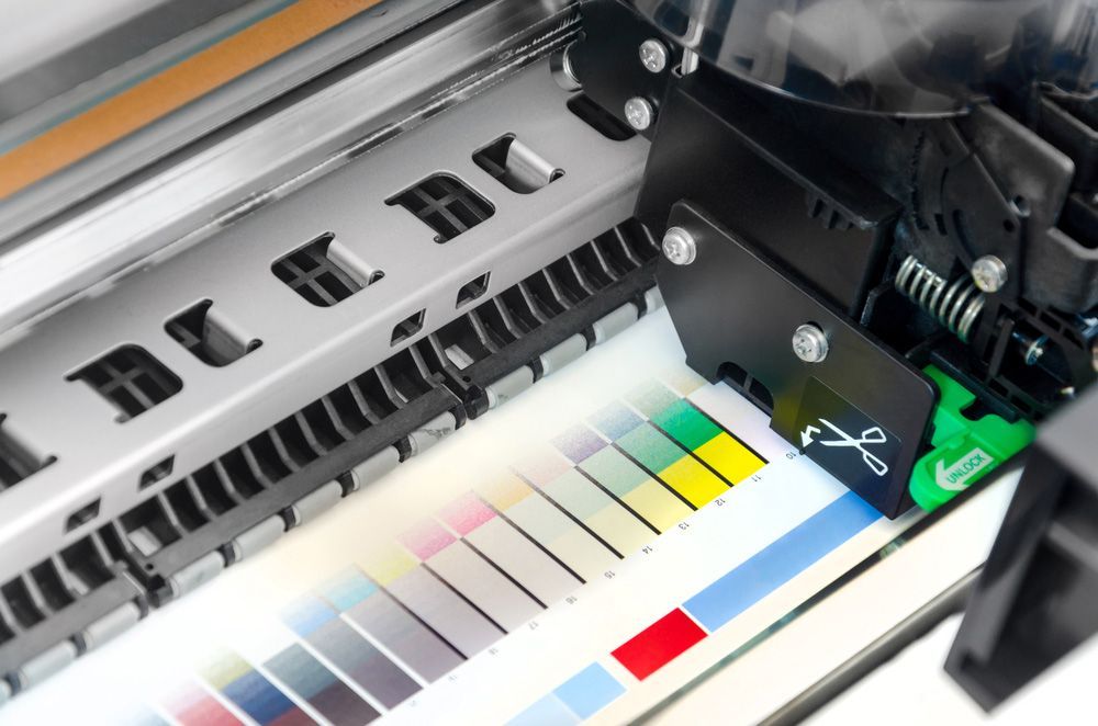 Close Up of a Printer With a Colour Grades on It — Classic Design & Print in Bundaberg, QLD
