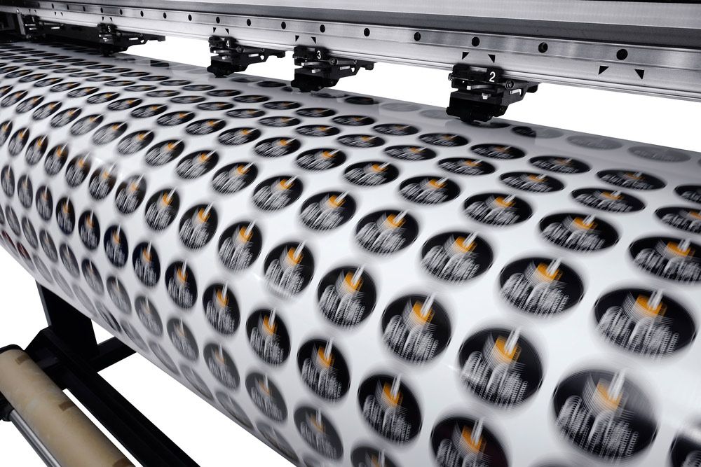 Machine That is Printing Stickers on a Roll — Classic Design & Print in Bundaberg, QLD