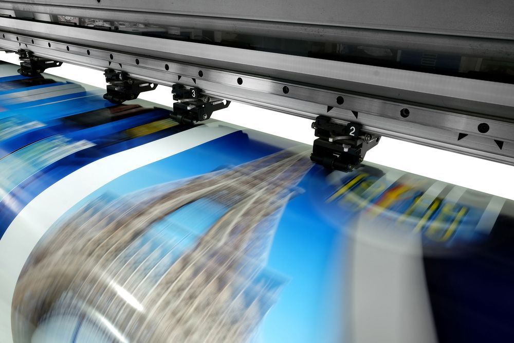 Printer is Printing a Picture of a Bridge on a Piece of Paper — Classic Design & Print in Bundaberg, QLD