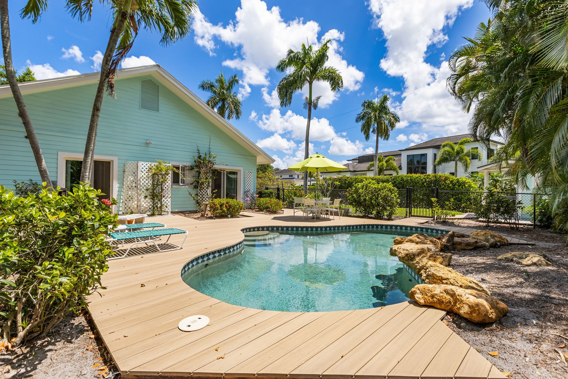 Wooden Deck with Swimming Pool — Naples, FL — Treeline Building