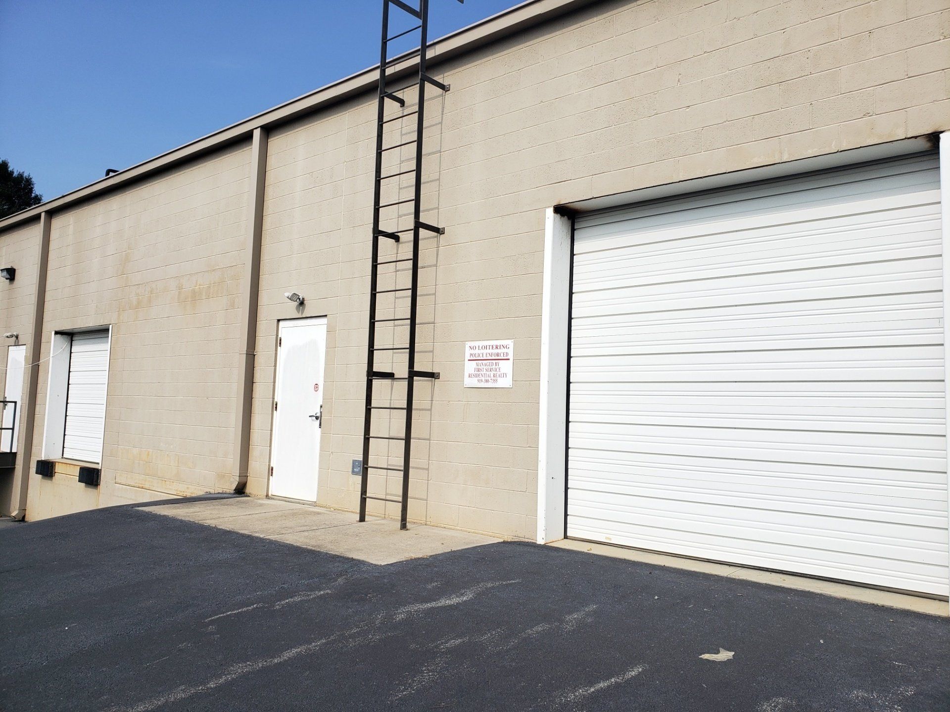 a ladder is attached to the side of a building