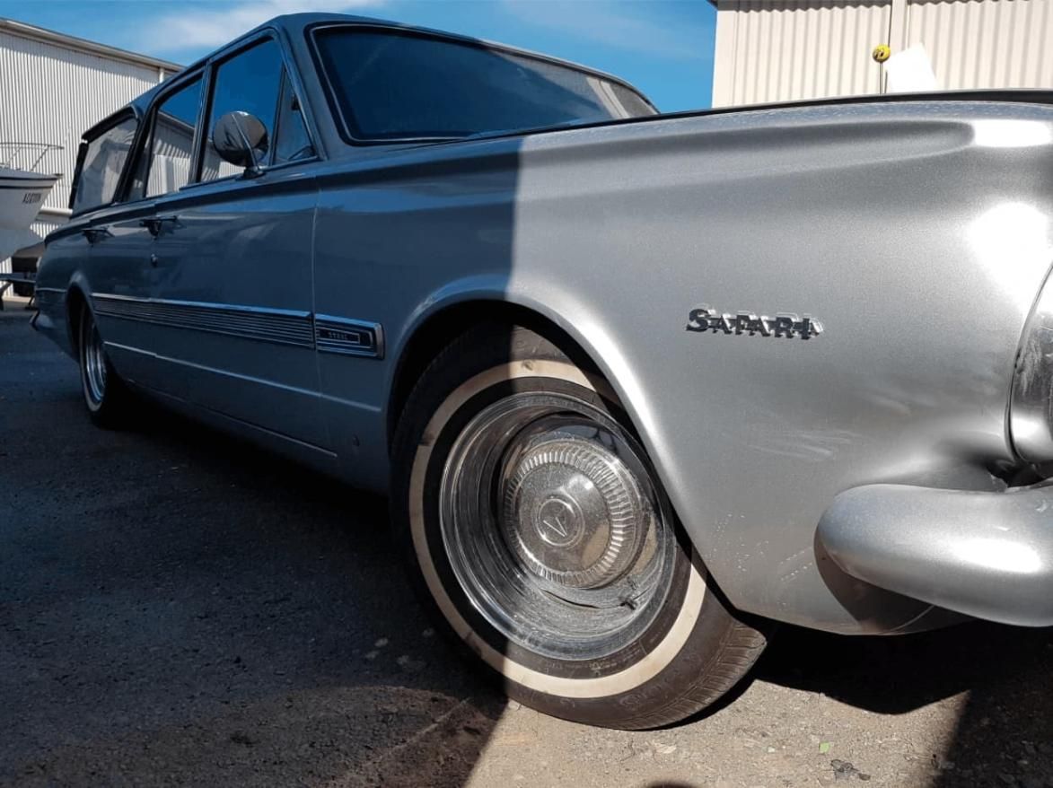 A Silver Saram Car Is Parked On The Side Of The Road — Platinum Paint & Panel Southport In Southport, QLD