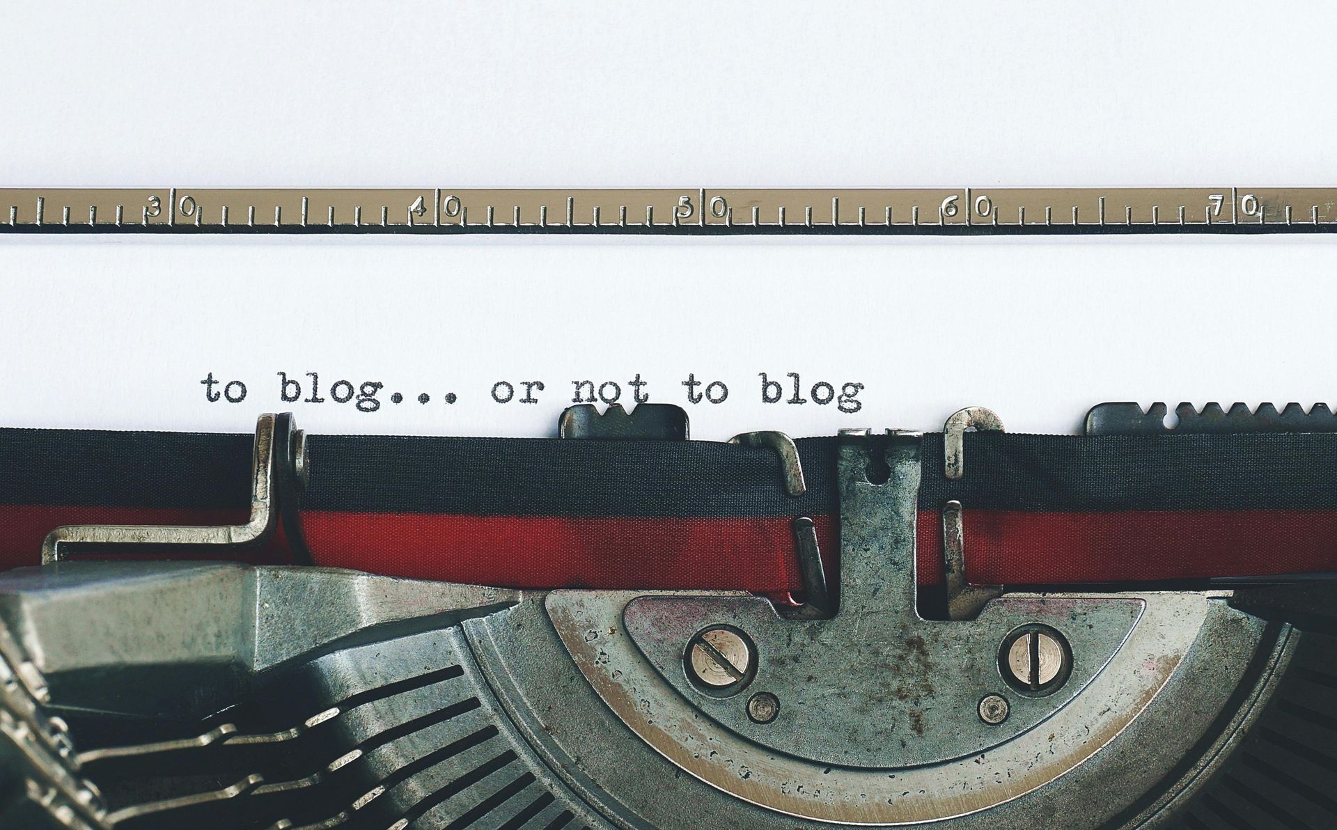 Typewriter with a page that reads 