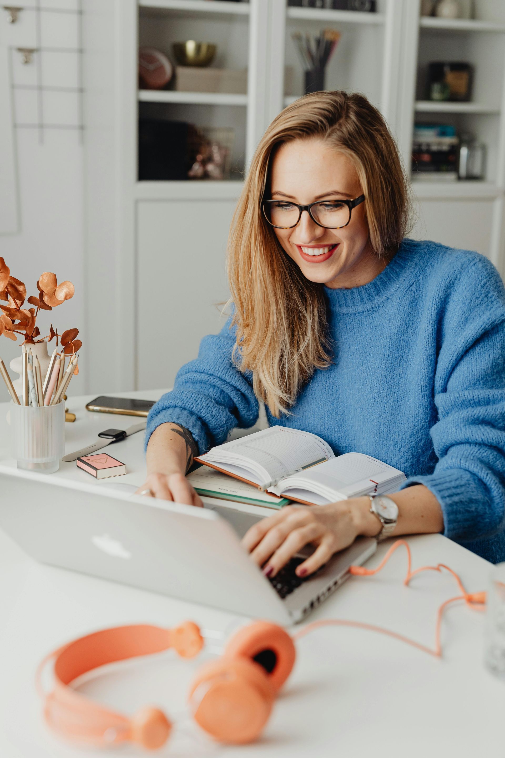 Virtual assistant typing and smiling supporting therapists