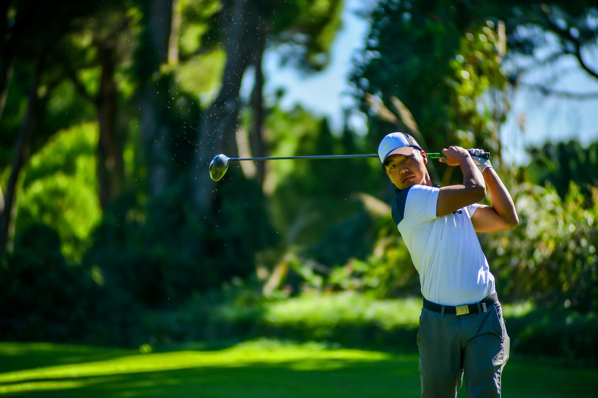 Golfer swinging a club