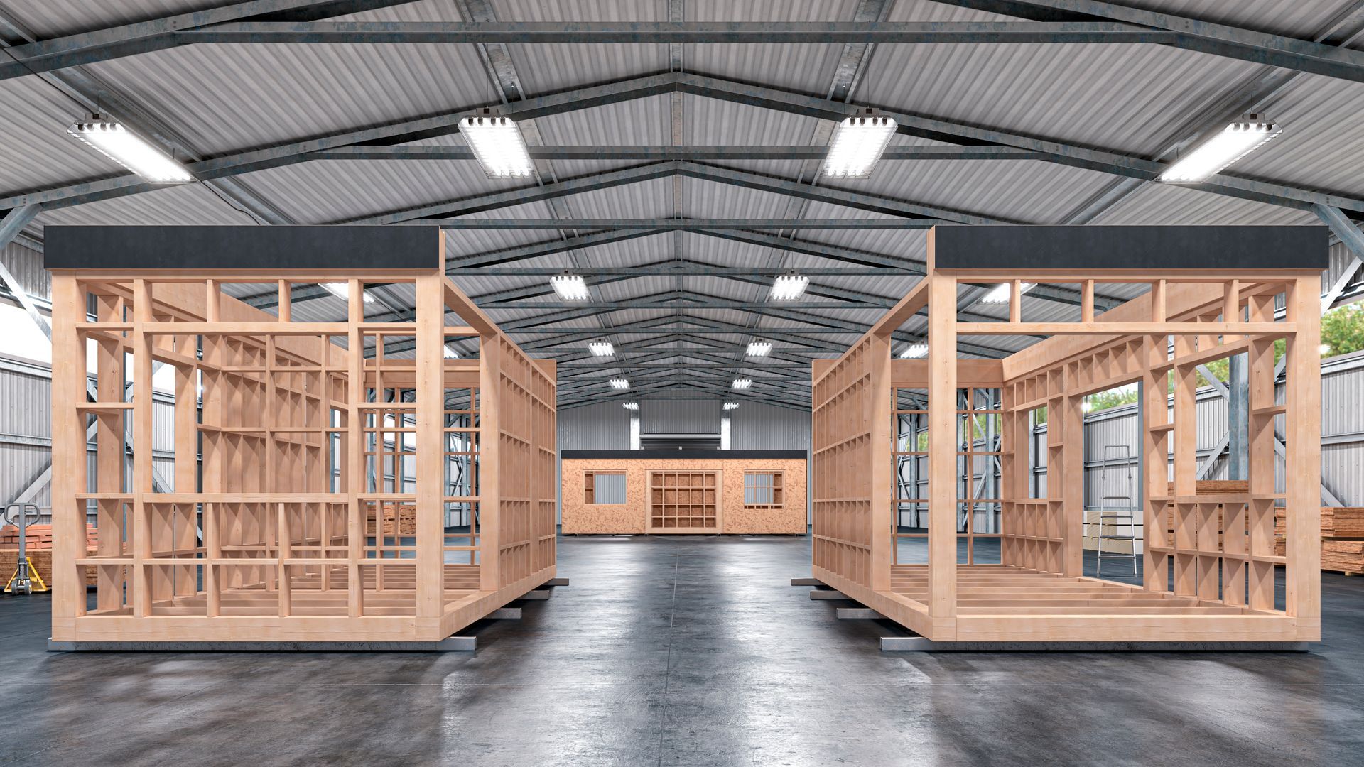 A large warehouse with a Yardedge wooden frames in it.