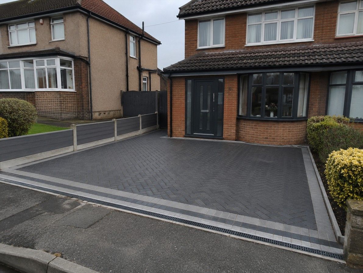 Charcoal block paving driveway installed at a residential property in Dinnington S25