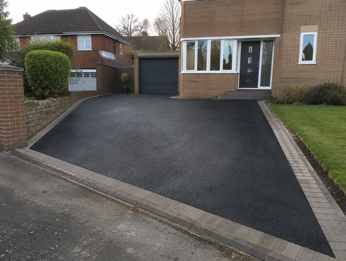 Freshly laid tarmac driveway at a residential property in Dinnington, South Yorkshire