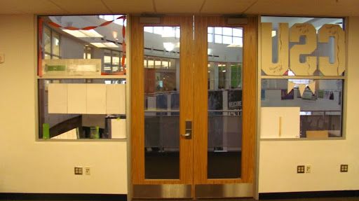 A door with the word uec on it