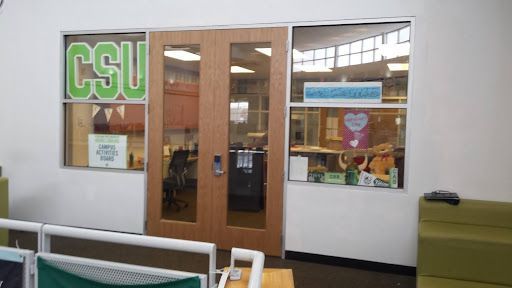 A building with a sign that says csu on it