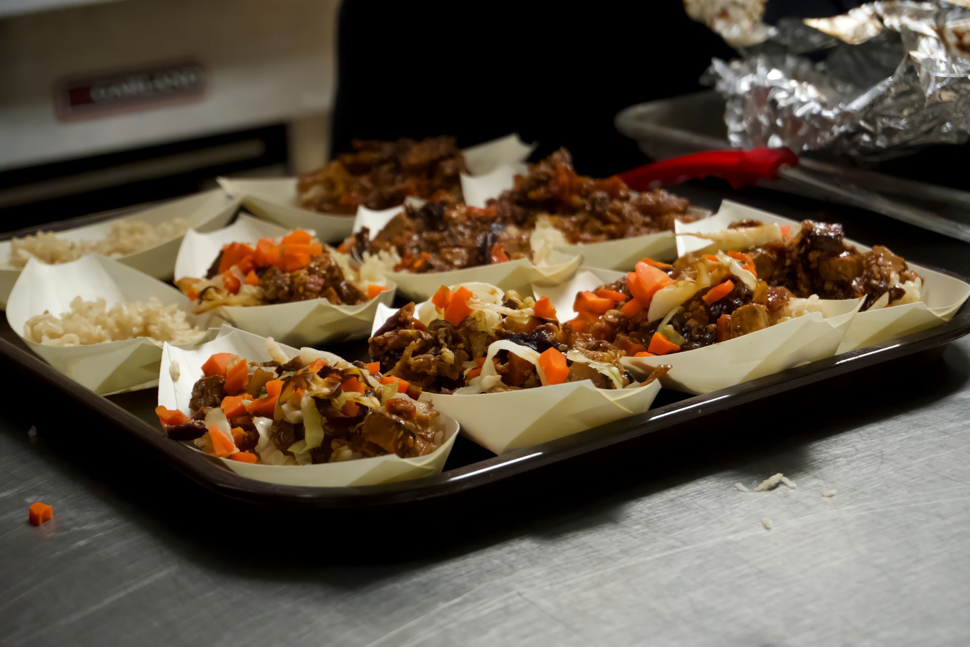A tray of food is sitting on a table.