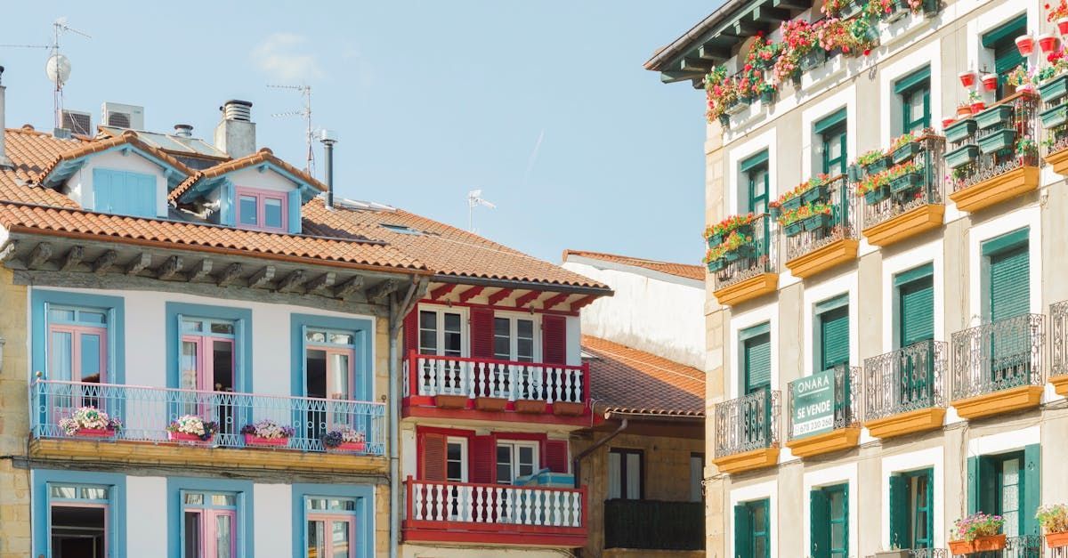 Colorful buildings with balconies in a European town.