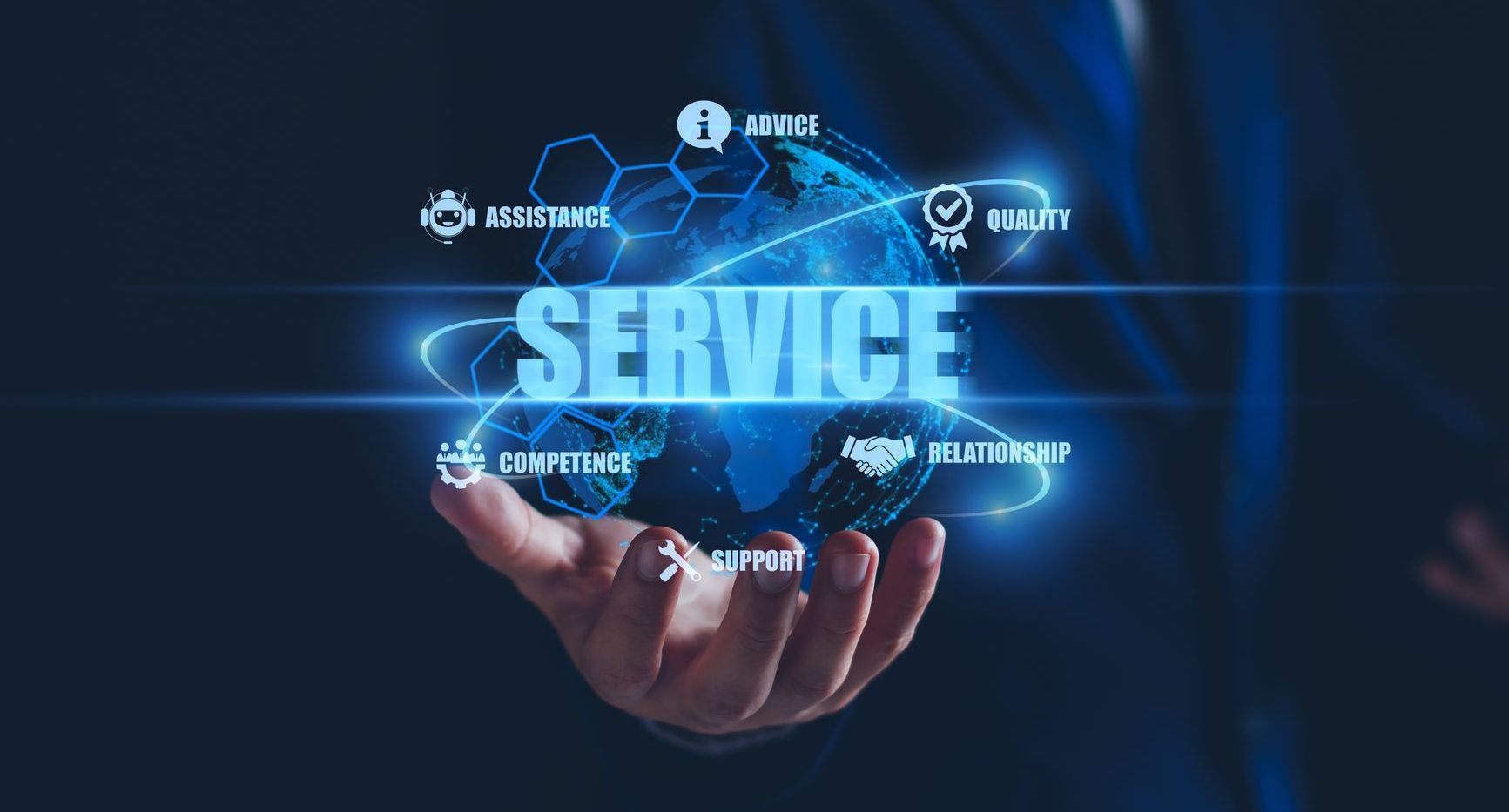 A man is holding a globe with the word service on it.