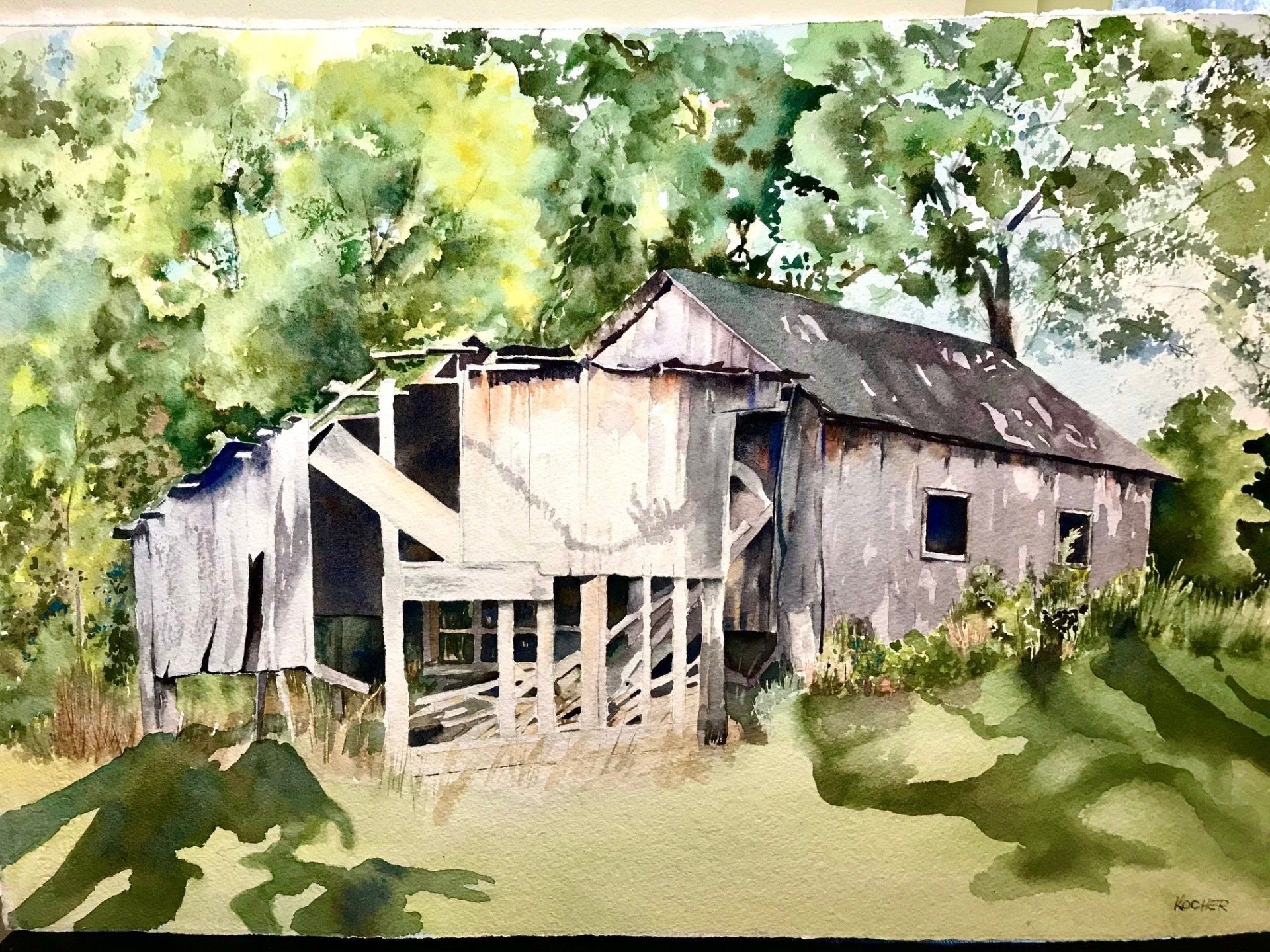 A watercolor painting of an old barn surrounded by trees.