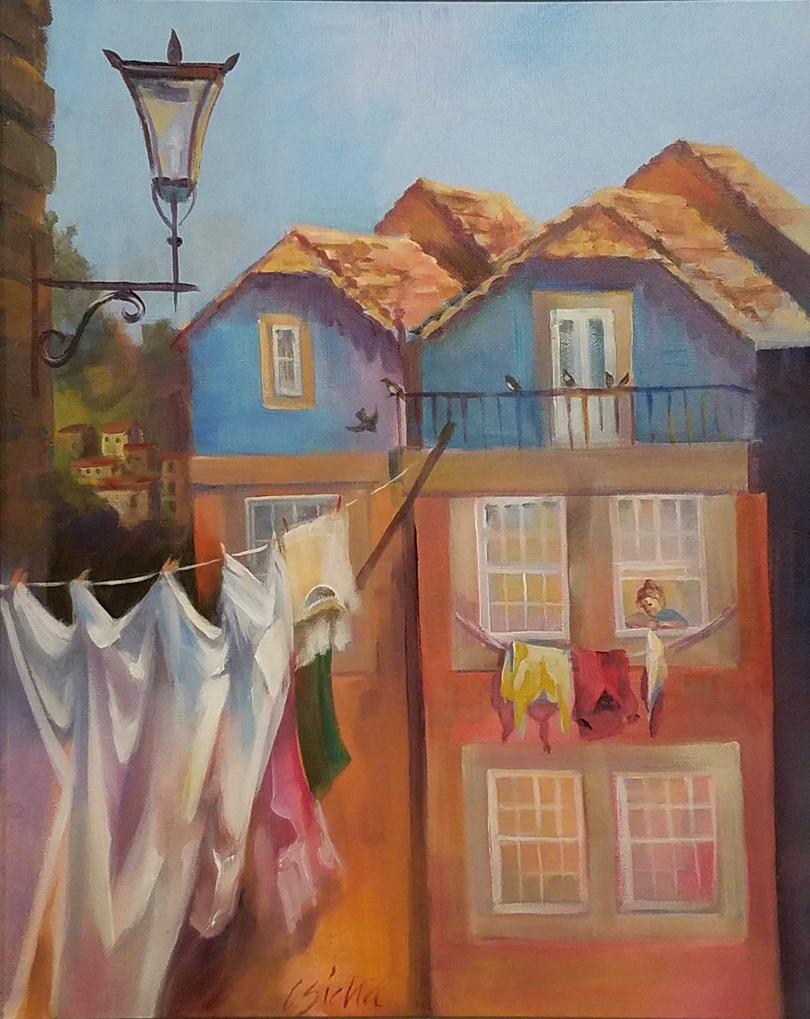A painting of a row of houses with clothes hanging on a line