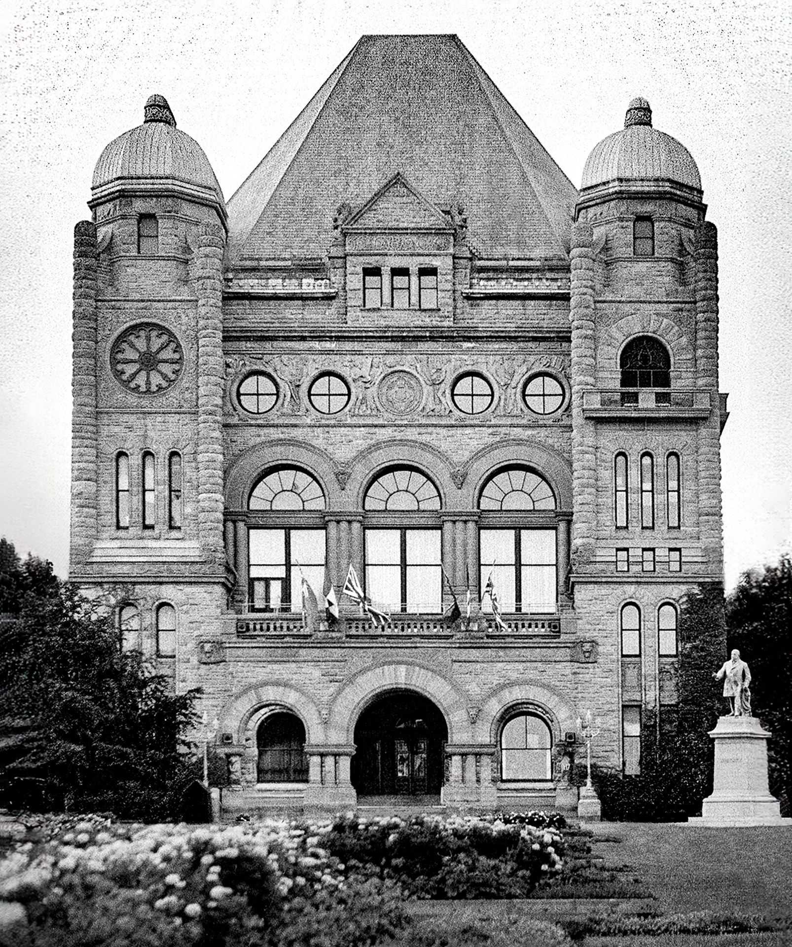 A large brick building with a clock on the top of it