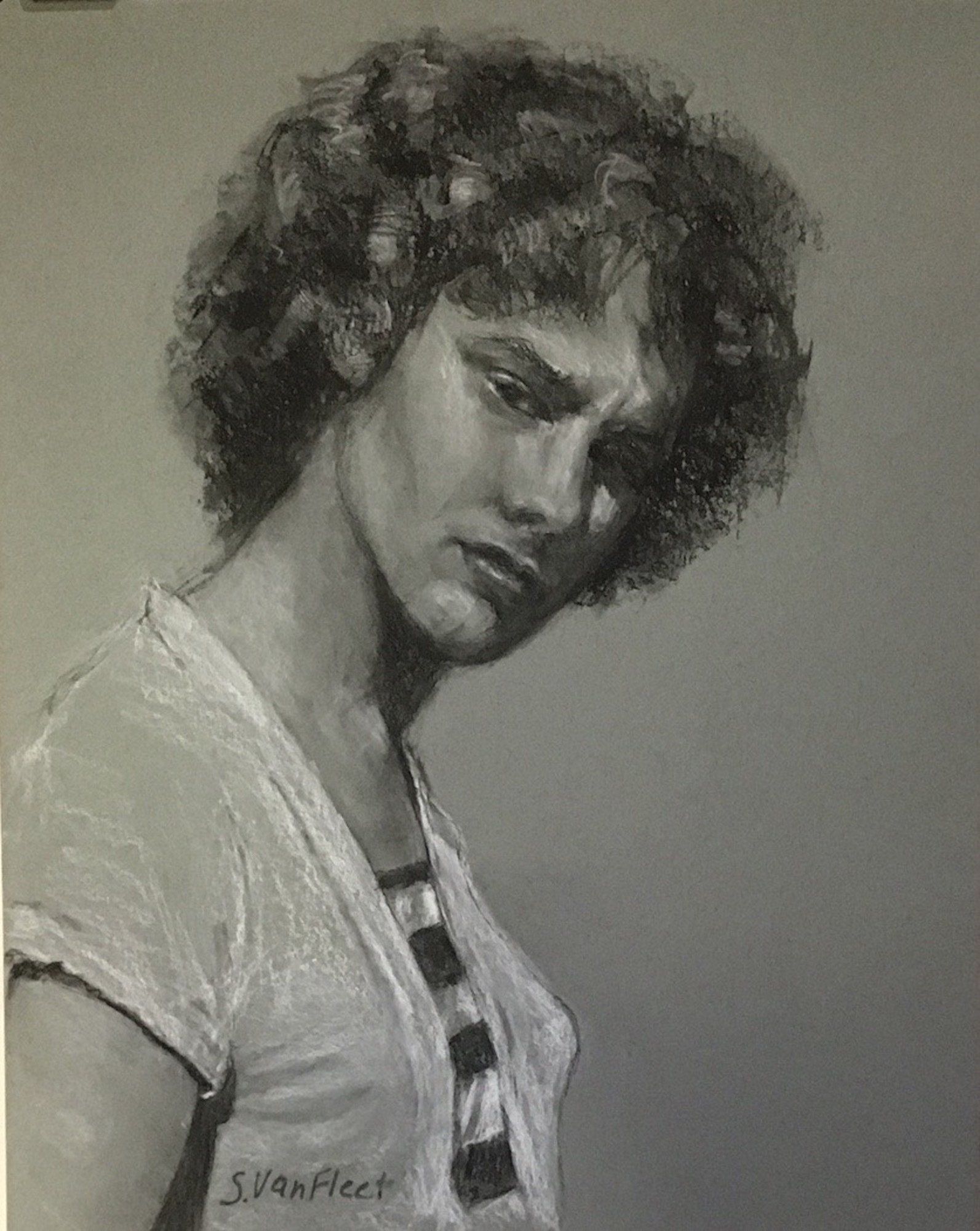 A black and white drawing of a woman with curly hair.