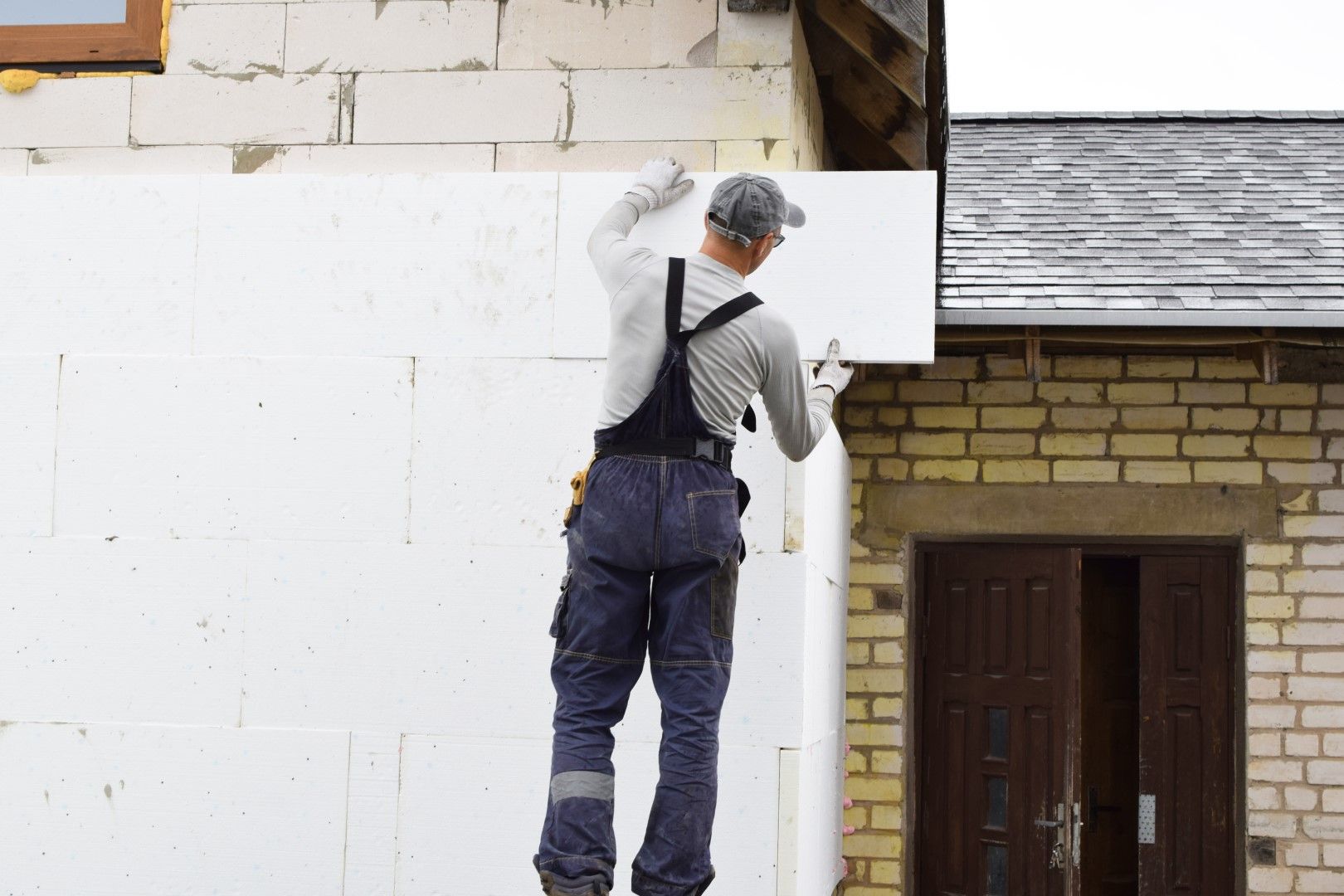 An image of a person working on Rigid Insulation Services in Spruce Grove, AB