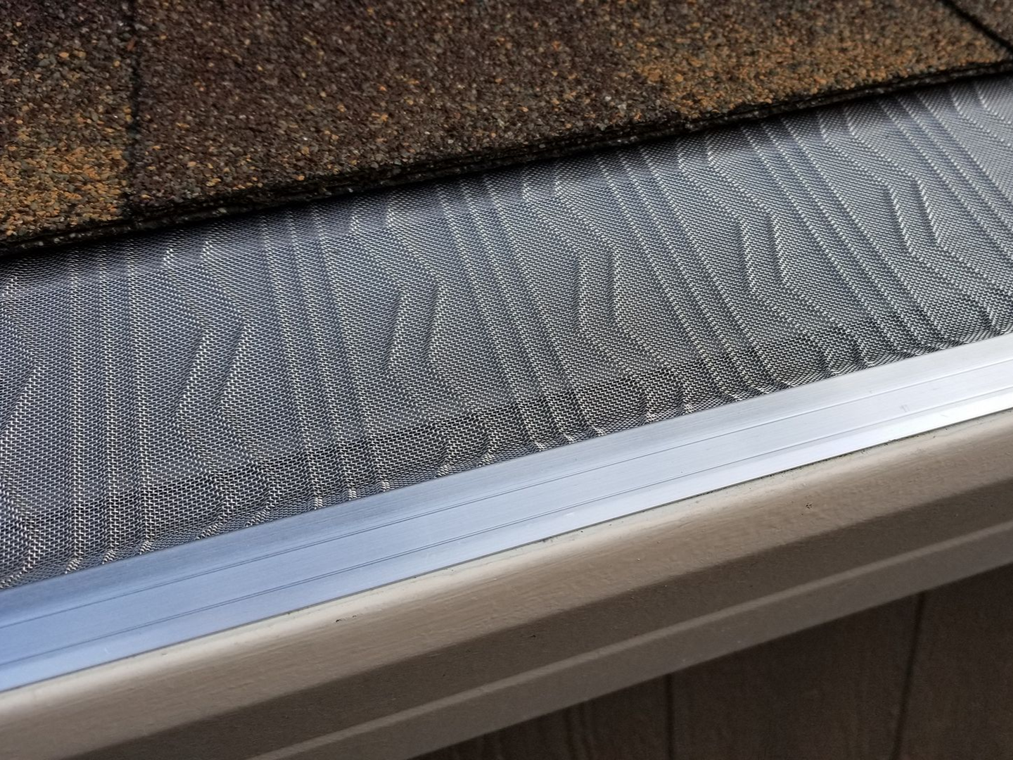 Gutter with mesh covering | gutter guard installation