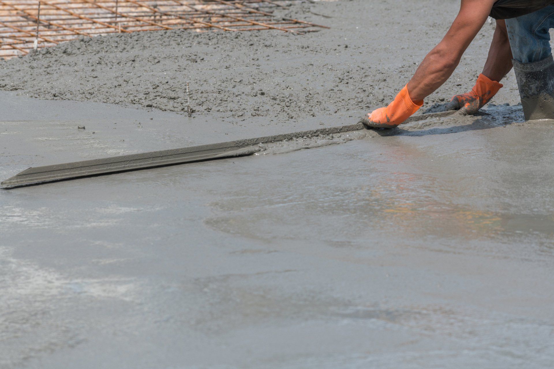 Worker Are Pouring Concrete — Honolulu, HI — Central Pacific Specialty Contractors