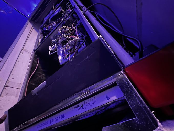 A dishwasher with the number 214103 on it