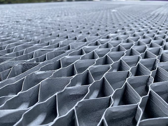 A close up of a honeycomb grid on a roof.