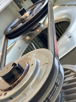 A close up of a belt on a machine.
