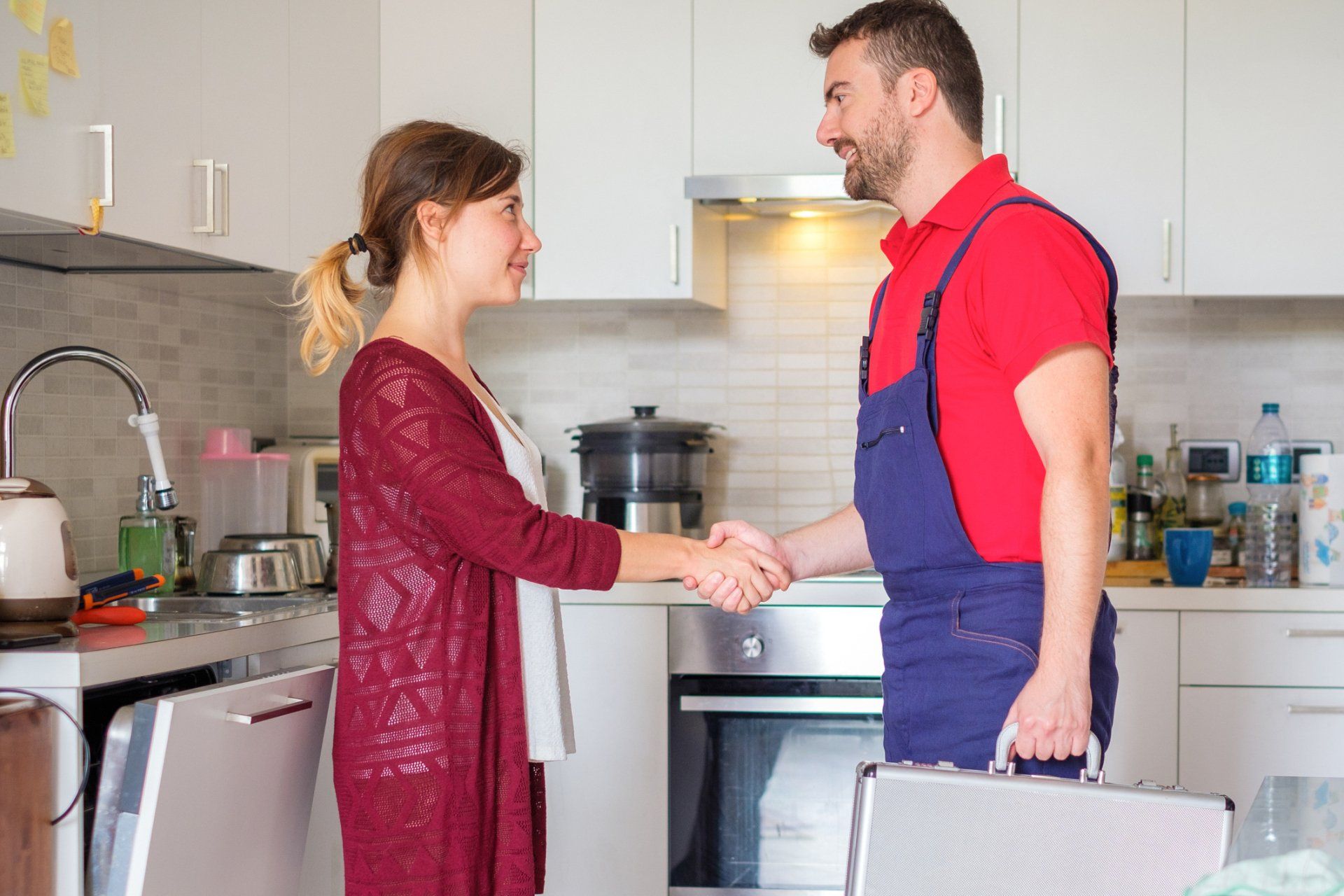 Handshake Between Woman and Good Plumber - Ford City, PA - Flanders Whole Home Solution