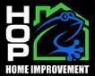 A logo for home improvement with a frog and a house.
