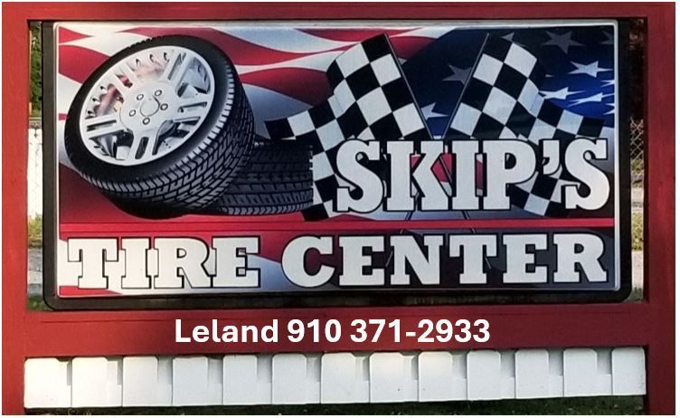 A sign for skip 's tire center in leland - Leland, NC - Skip's Tire Center