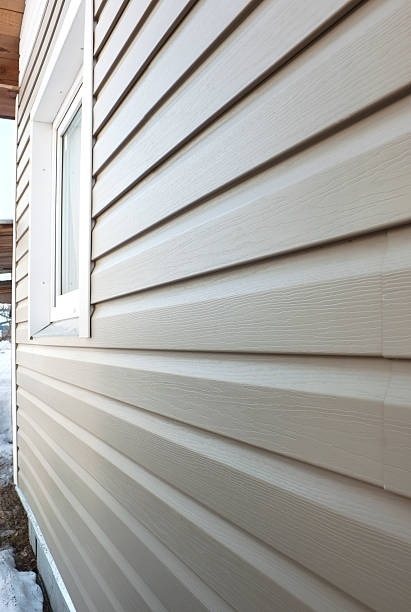 Wall finished in vinyl siding.