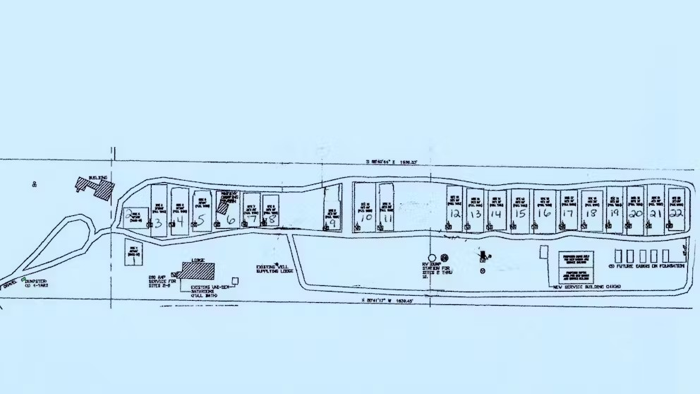 A black and white drawing of a train on a blue background