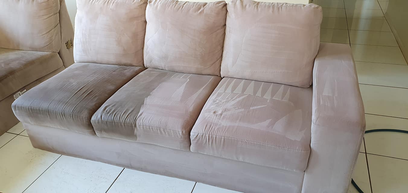 Light brown coloured lounge showing dirty and clean parts of the lounge