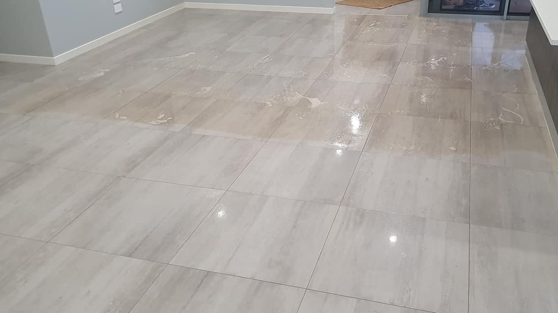 Porcelain Tile and grout cleaned with alkaline cleaner and extracted