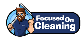 Focused on Cleaning Logo with white text and dark blue backgound with a bearded man holding a carpet cleaning tool to the left.
