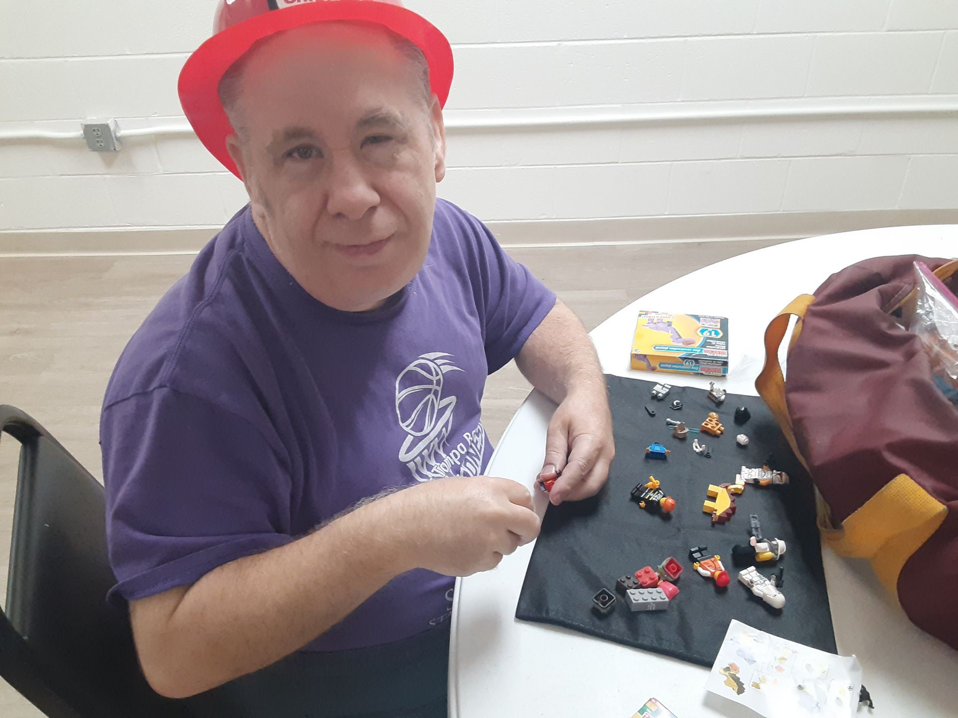 Man Doing Assembling Activity — Clearwater, FL — The Arc Tampa Bay