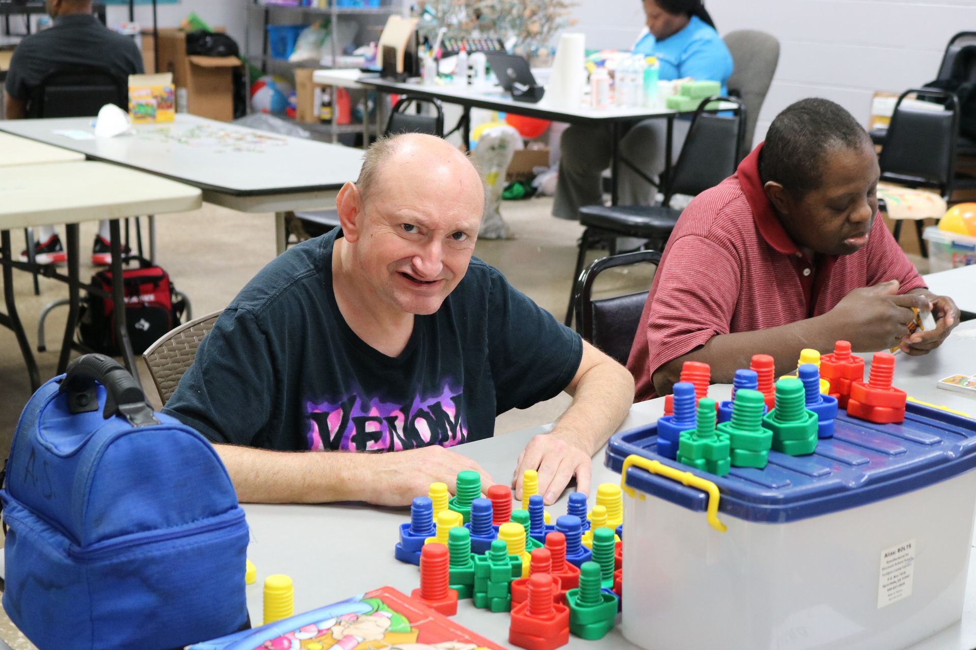 Happy Man Doing Peace Sign — Clearwater, FL — The Arc Tampa Bay