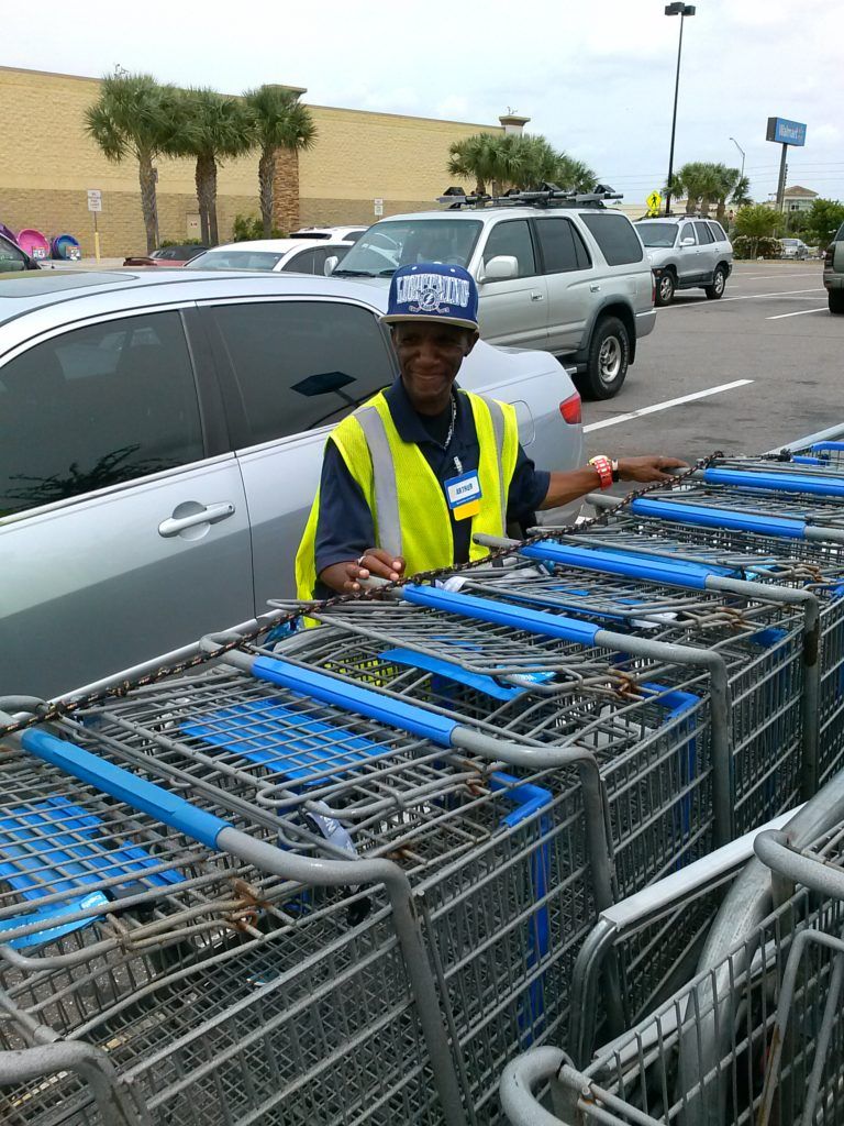Man Organizing Shopping Carts — Clearwater, FL — The Arc Tampa Bay