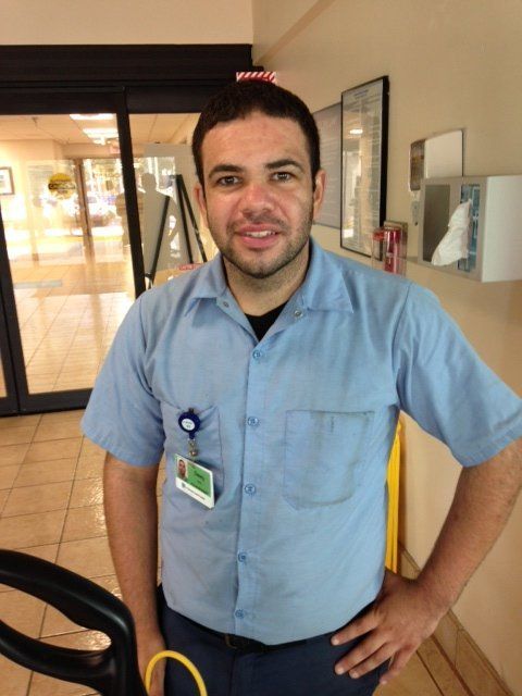 Man on Cleaning Services — Clearwater, FL — The Arc Tampa Bay