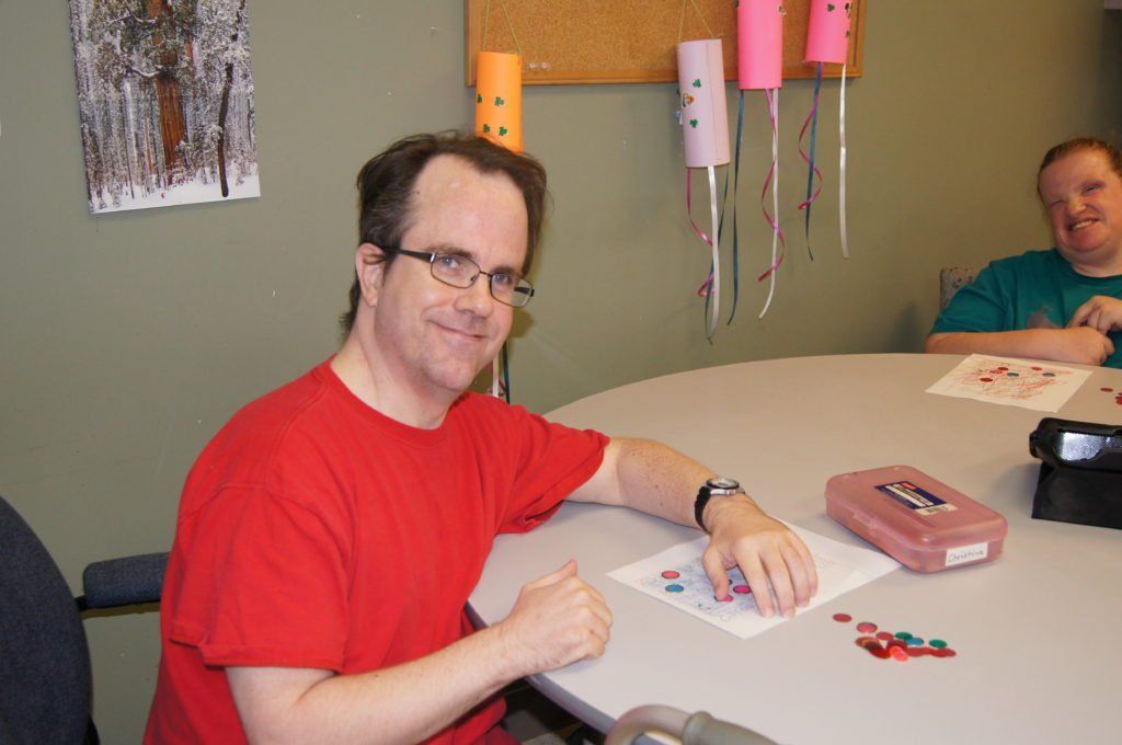 Man in Red Shirt — Clearwater, FL — The Arc Tampa Bay