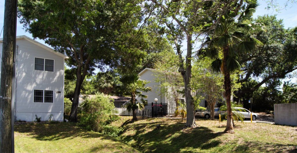 House with White Sidings — Clearwater, FL — The Arc Tampa Bay