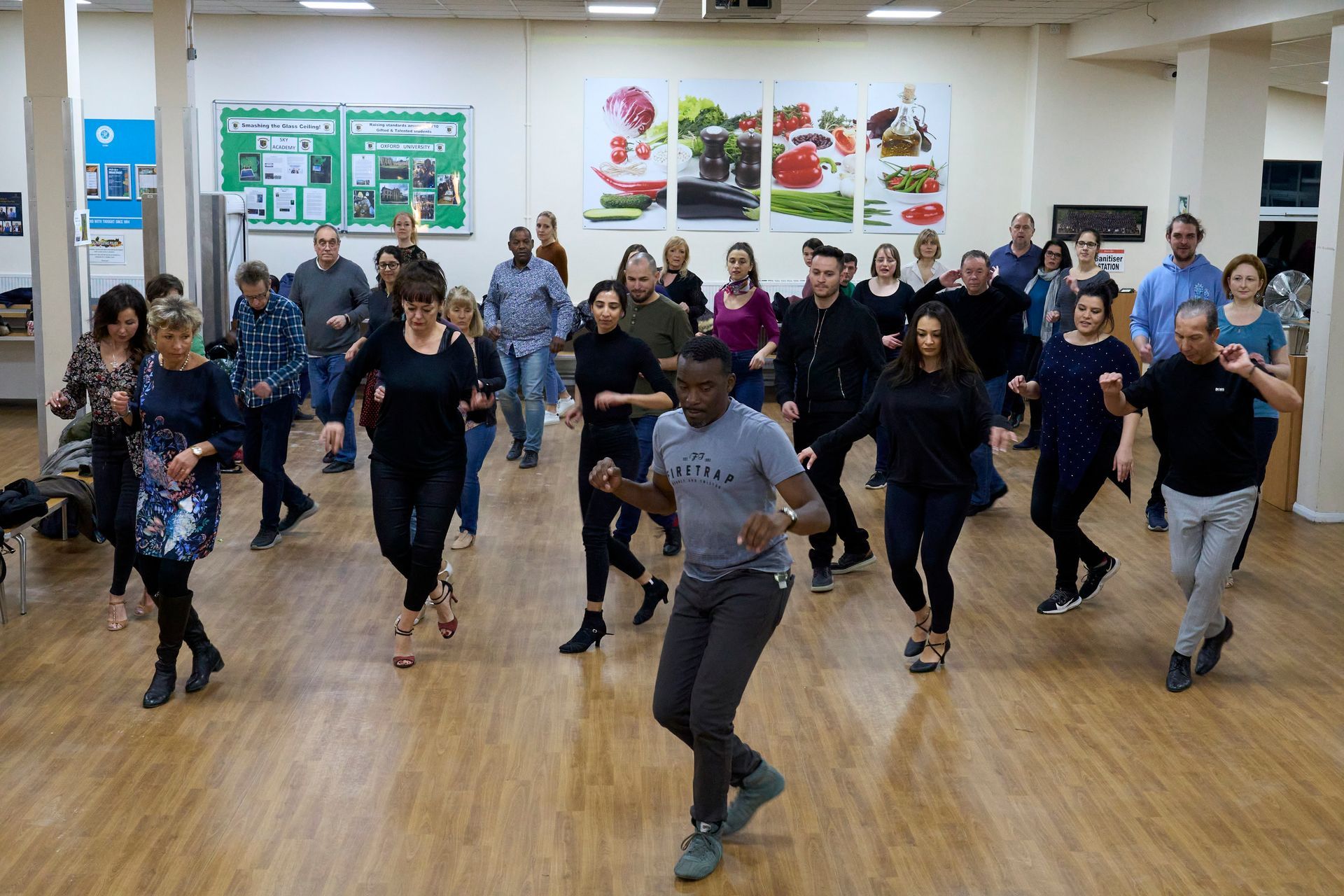 Salsa students doing a technique workshop